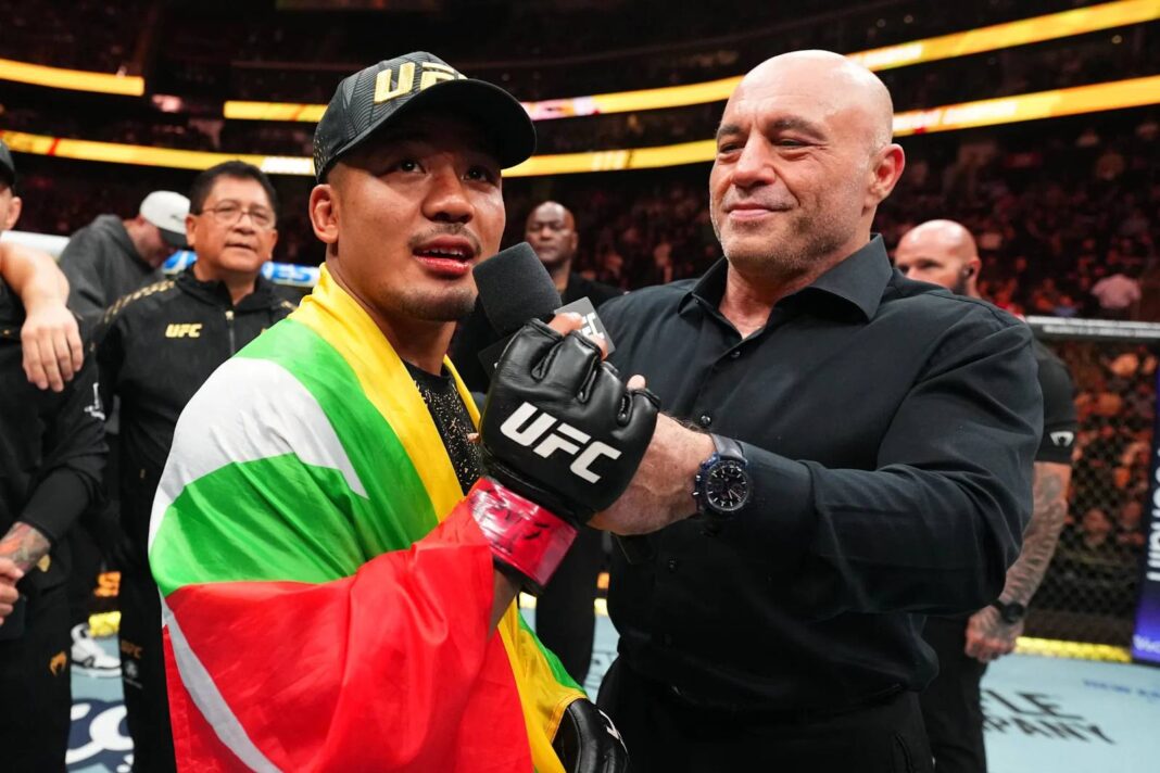 Myanmar’s Joshua Van reacts after defeating Japan’s Tatsuro Taira by TKO