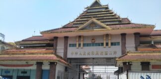 Debt, Bribes, and Exploitation: Myanmar Youth Risk All for Jobs in China Myanmar–China border gate