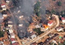 Displaced Villagers Return to Destroyed Homes in Southern Shan State Nanneint Village in Panglaung Township burns during clashes in March 2023