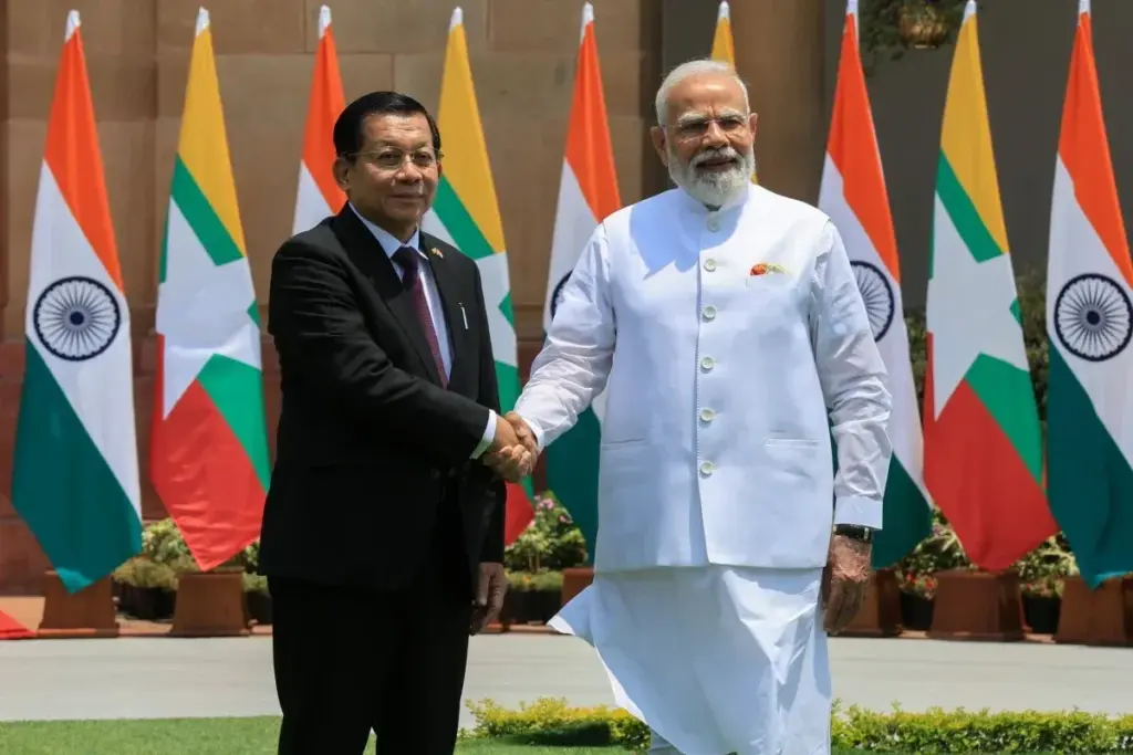 Myanmar military leader Min Aung Hlaing shakes hands with Indian Prime Minister Narendra Modi