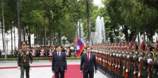THE UNWINNABLE GAME: Why the Myanmar Junta Cannot Buy Legitimacy President Thongloun Sisoulith (left) welcomes Myanmar junta chief Min Aung Hlaing during his visit to Laos Photo Vientiane Times